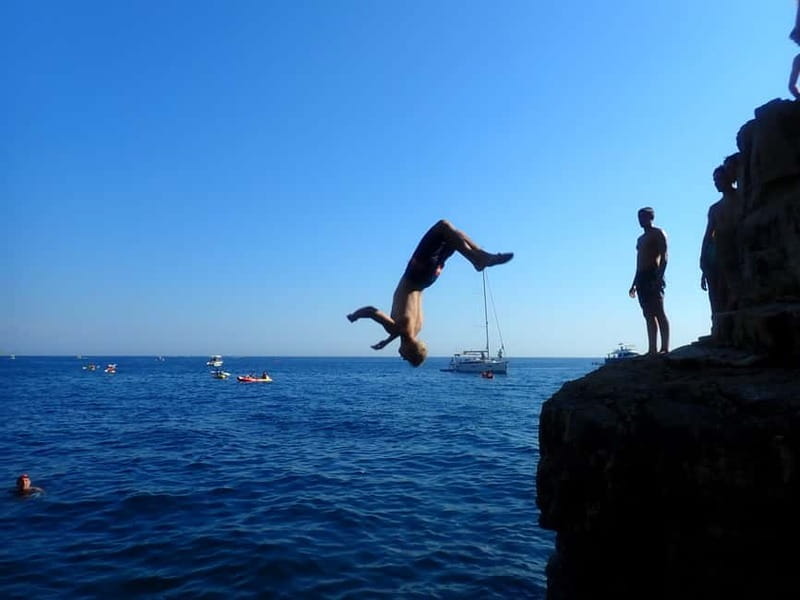 Pula: Sea Adventure – Boat, Kayak, Snorkeling & Cliff Jumps - Paddling beside the Muzil Peninsula