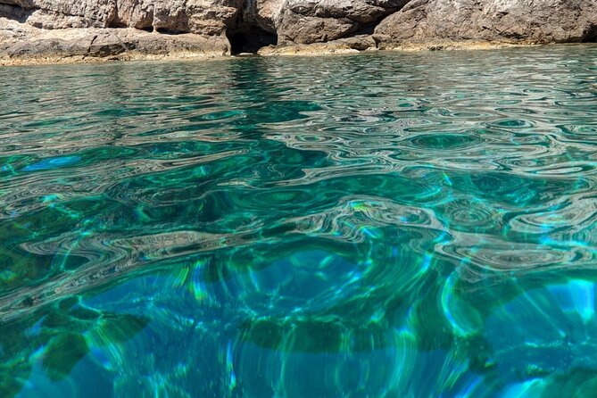 Rent a small boat without skipper - explore the islands and find hidden caves - The best use of the map: caves, coves, and island stops