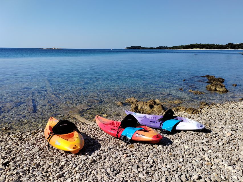 Rovinj: Golden Cape Desert Islands Kayak & Snorkeling Tour - Snorkeling, swimming, and optional rock jumping