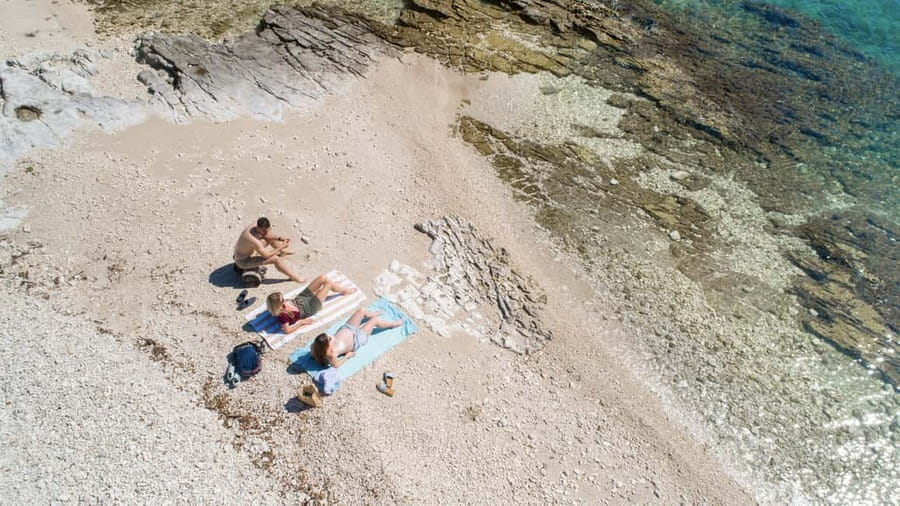 Rovinj: Luxury Island Hopping with Swimming & Snorkeling - Figarola offers shade and a slower pause