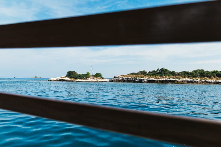 Rovinj: Sunset Cruise with Swim Stop, Drinks, and Fruits - Sunset over Rovinj and the return ride