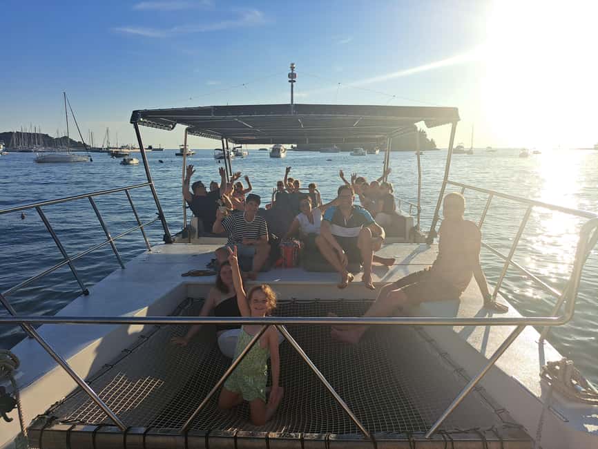 Rovinj: Sunset & dolphin group tours with Catamaran - Sunset From the Water