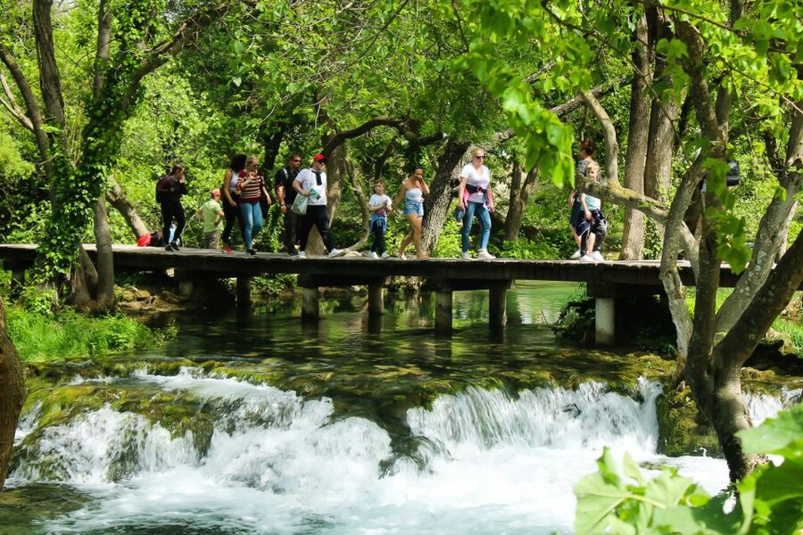 Split: Krka Waterfalls With Boat Cruise, Wine and Olive Oil - Old mills, stone houses, and a pioneering power station