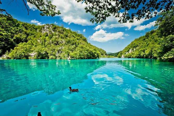 Split to Zagreb Group Transfer with Plitvice Lakes guided tour - Boat rides, the park train, and Big Waterfall
