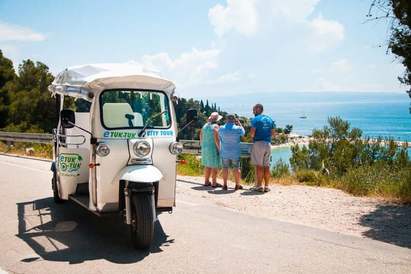 Split: Top City Highlights Electric Tuk-Tuk Tour - Kašjuni Beach brings a short coastal stop