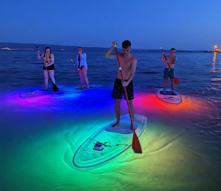 Split: Transparent SUP night Glow tour - The safety briefing and first paddle strokes