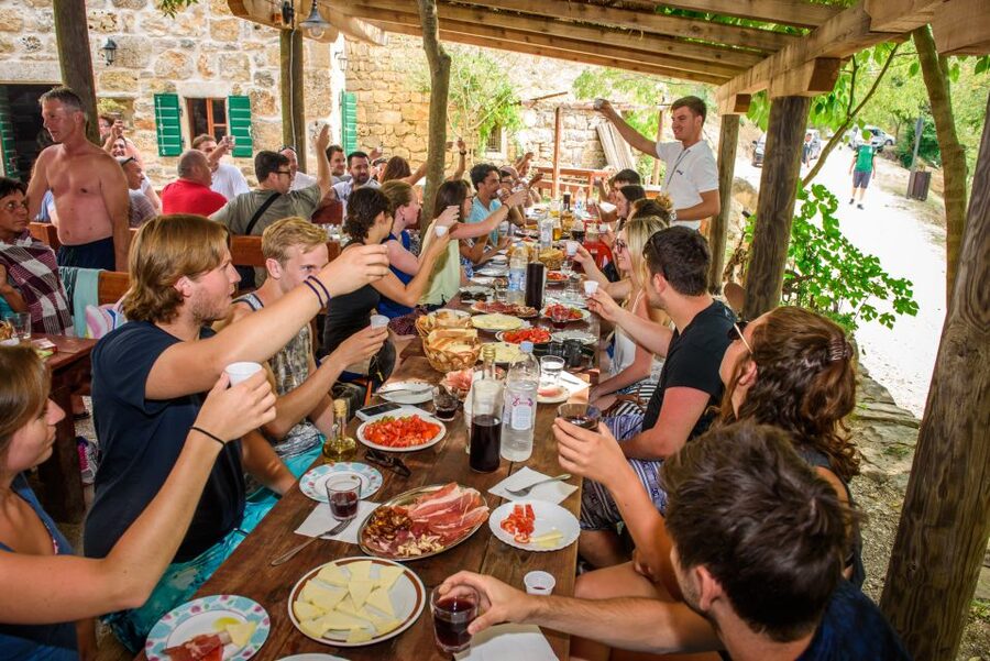 Split/Trogir: Krka National Park Day Trip with Wine Tasting - A short boat ride through the Krka canyon