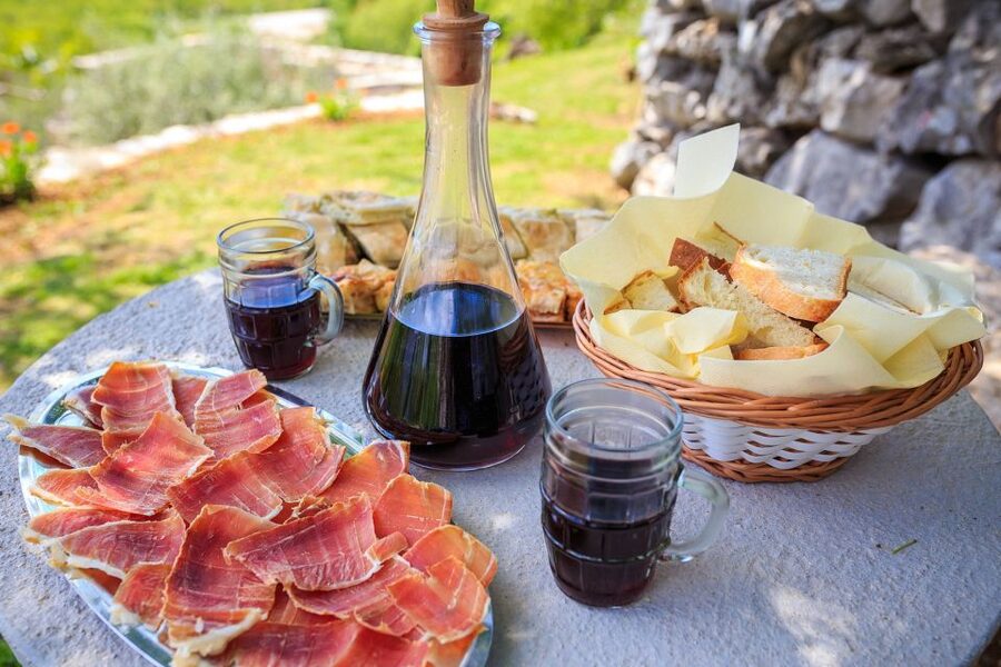Traditional Dalmatian Cooking Class from Dubrovnik - Sitting down to the four-course meal