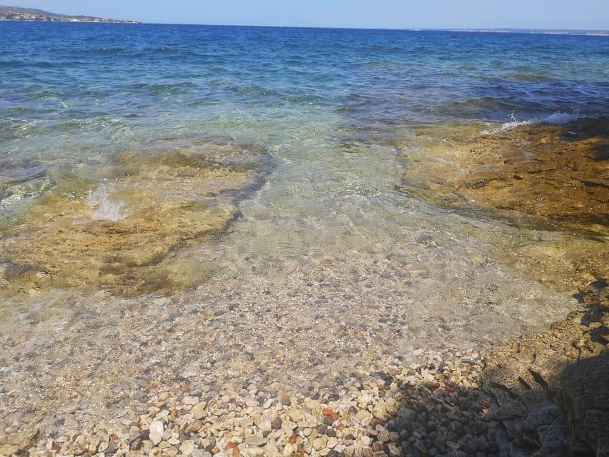 Zadar: 3-Stop Blue Lagoon & Snorkeling Cruise with Drinks - Stop three: Preko, sandy beach, and Galevac