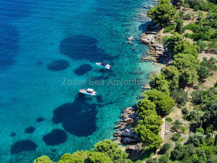 Zadar: Island Hopping Speedboat Adventure with Aperol Spritz - Stop one: a clear-water bay for swimming