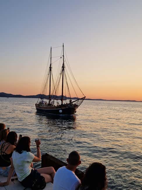Zadar: Sunset Cruise on Traditional Boat with Wine - Wine, juice, water, and the onboard setup