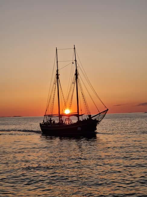 Zadar: Sunset Cruise on Traditional Boat with Wine - Finding the pier beside the white lighthouse