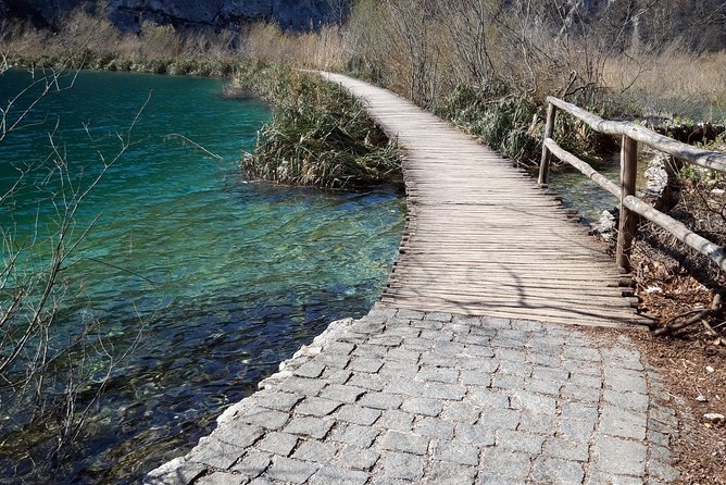 Zadar to Plitvice lakes: Guided tour with pre-booked tickets - The boat ride, electric train, and crowded paths