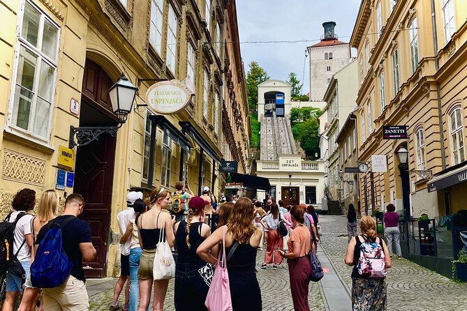 Zagreb Small Group Guided Walking Tour with WW2 Tunnels - Zagreb Cathedral and Dolac Market show two sides of local life